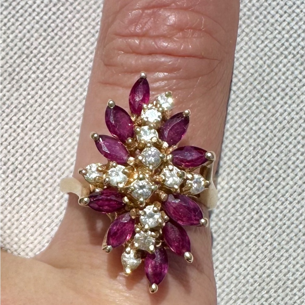 Elegant 14k Yellow Gold and Ruby Gemstone Ring with Round Diamonds.